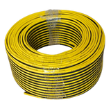 Coiled yellow and black cable on a white background