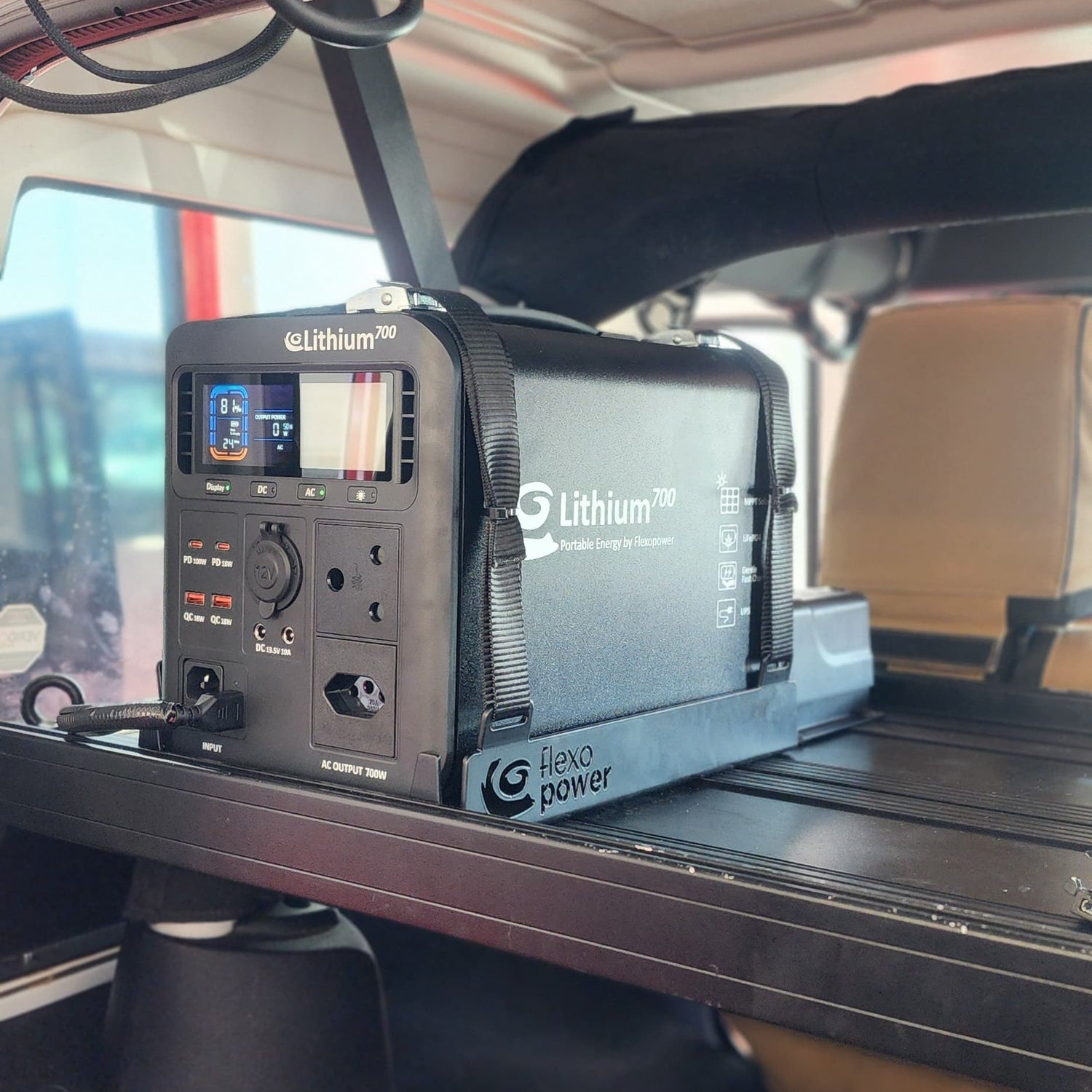 In-car electronic equipment on a shelf inside a vehicle