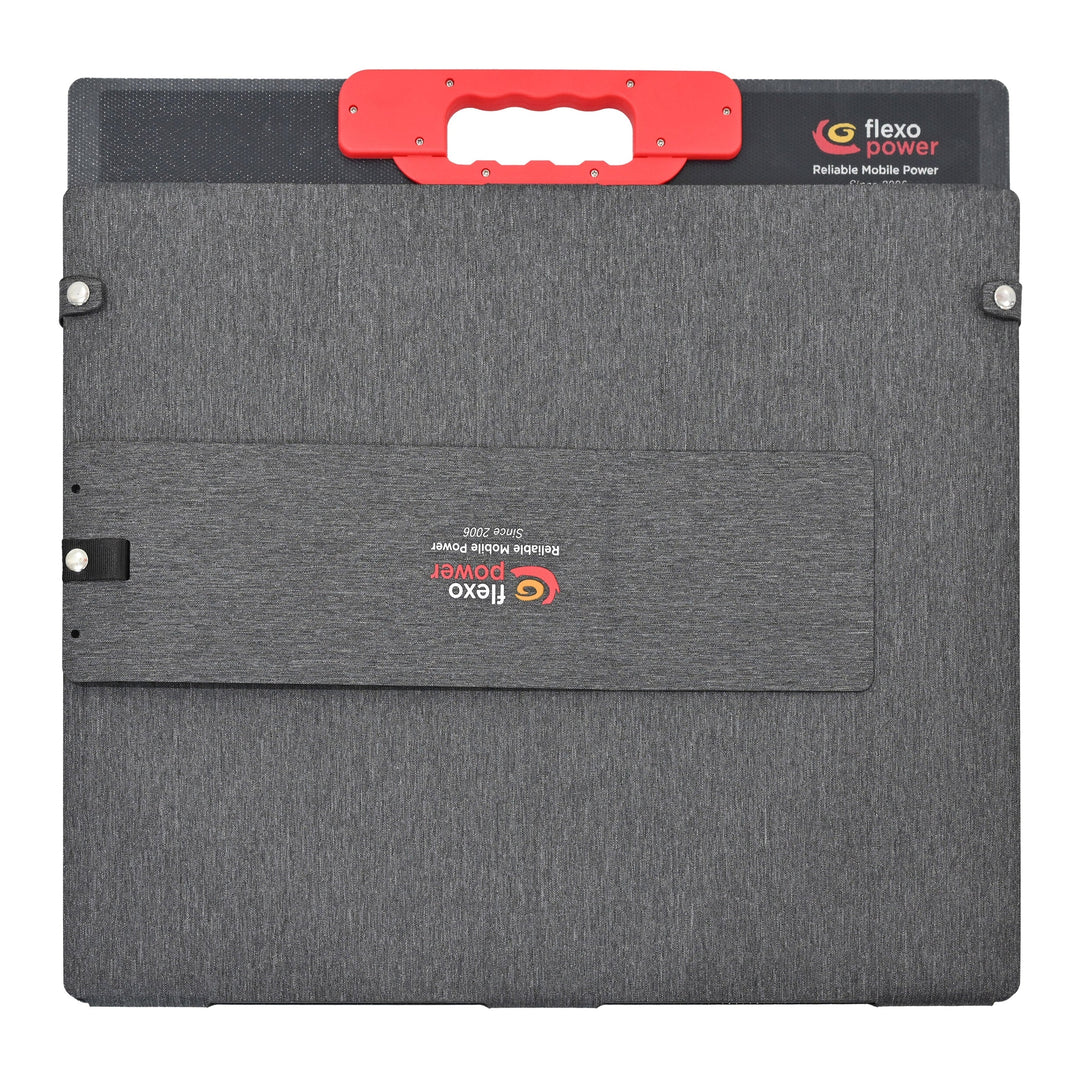 Gray carrying portable solar panel case with red handle on a white background