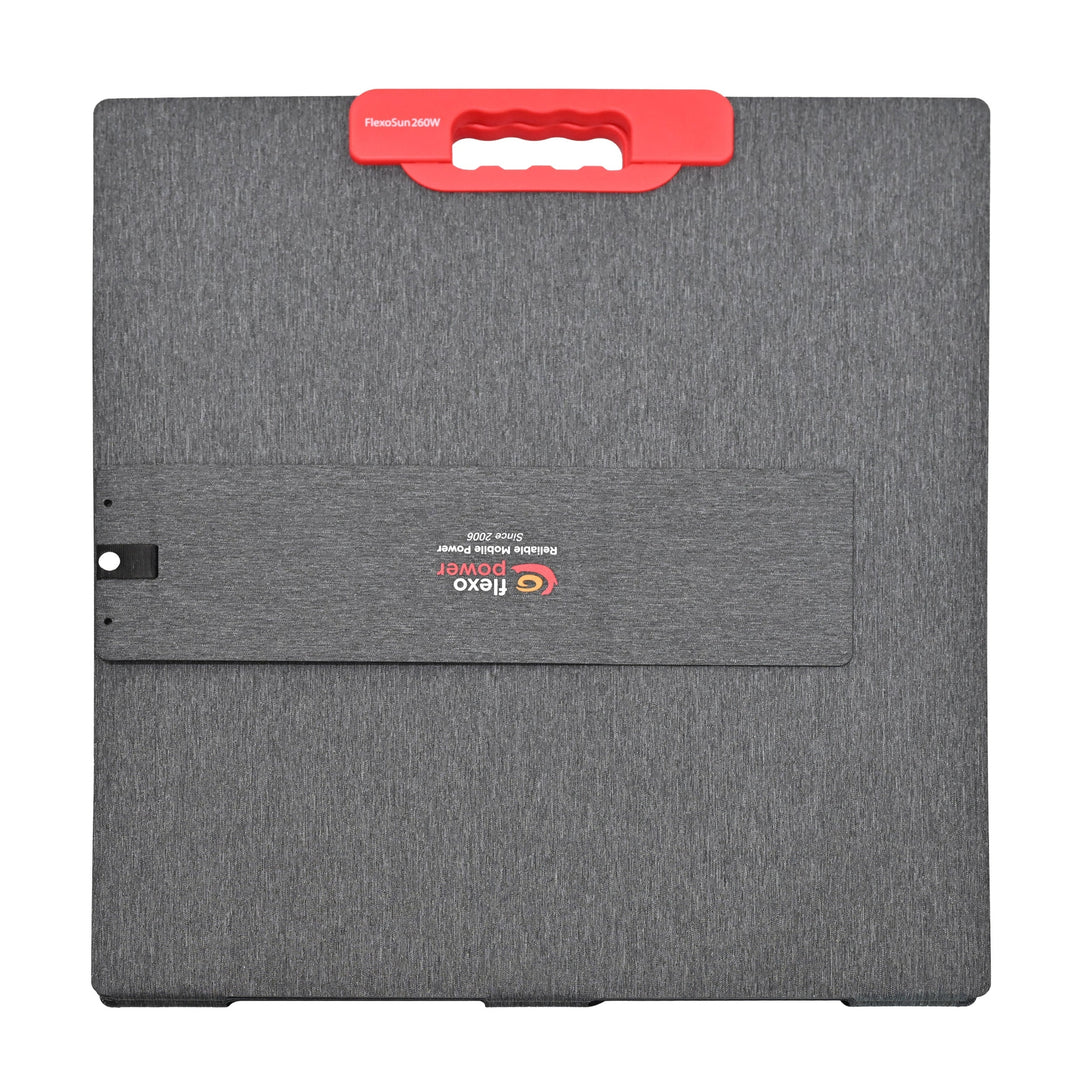 Gray carrying portable solar panel with a red handle on a white background